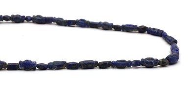 Lot 180 - A string of Bactrian lapis lazuli beads