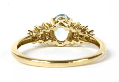 Lot 158 - A gold aquamarine and diamond ring
