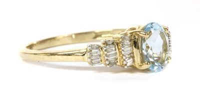 Lot 158 - A gold aquamarine and diamond ring