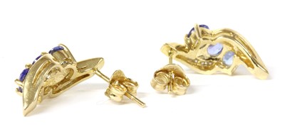 Lot 175 - A pair of gold tanzanite and diamond stud earrings