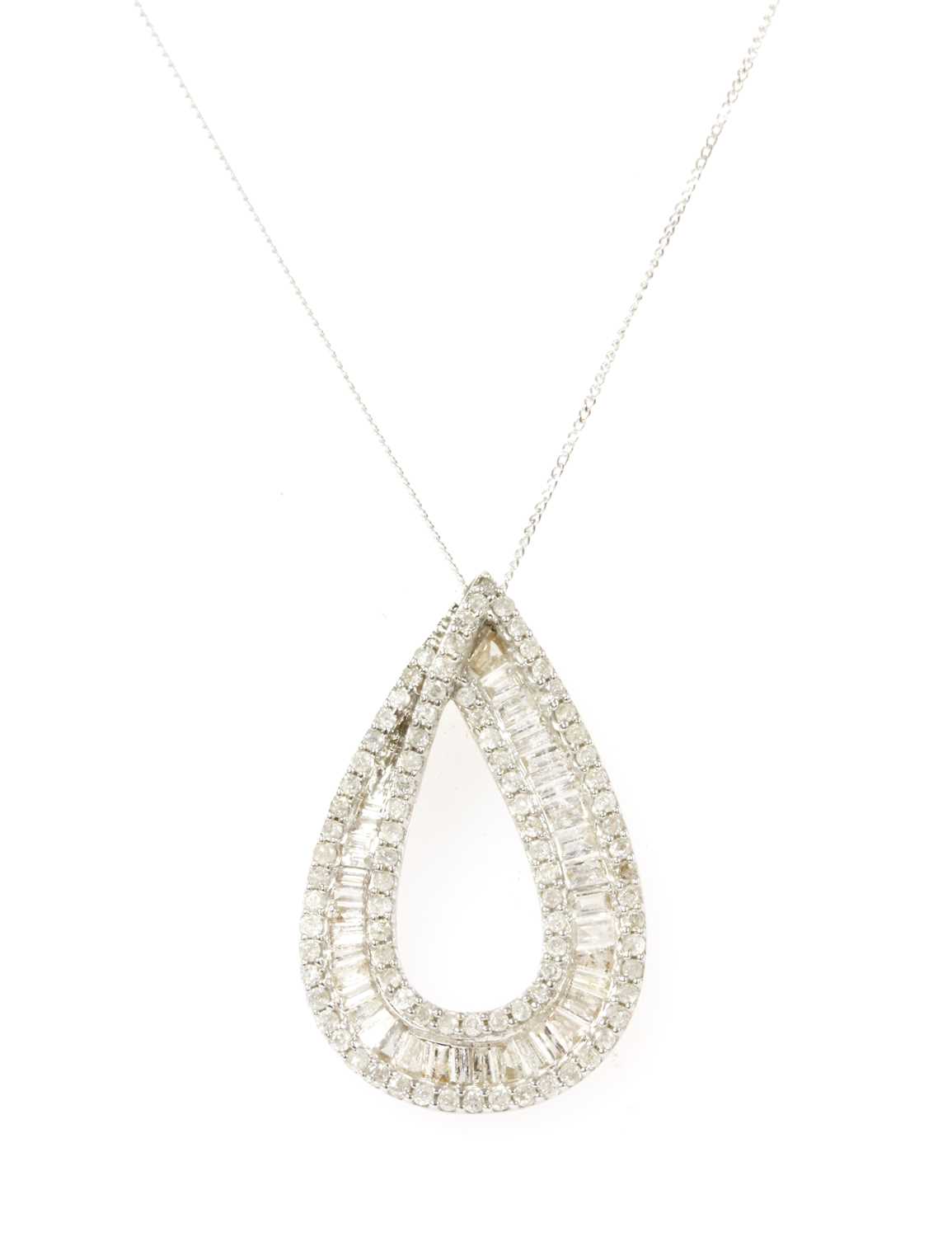Lot 90 - A white gold diamond pendant