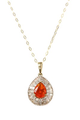 Lot 193 - A gold fire opal and diamond cluster pendant