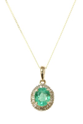 Lot 121 - A gold emerald and diamond cluster pendant