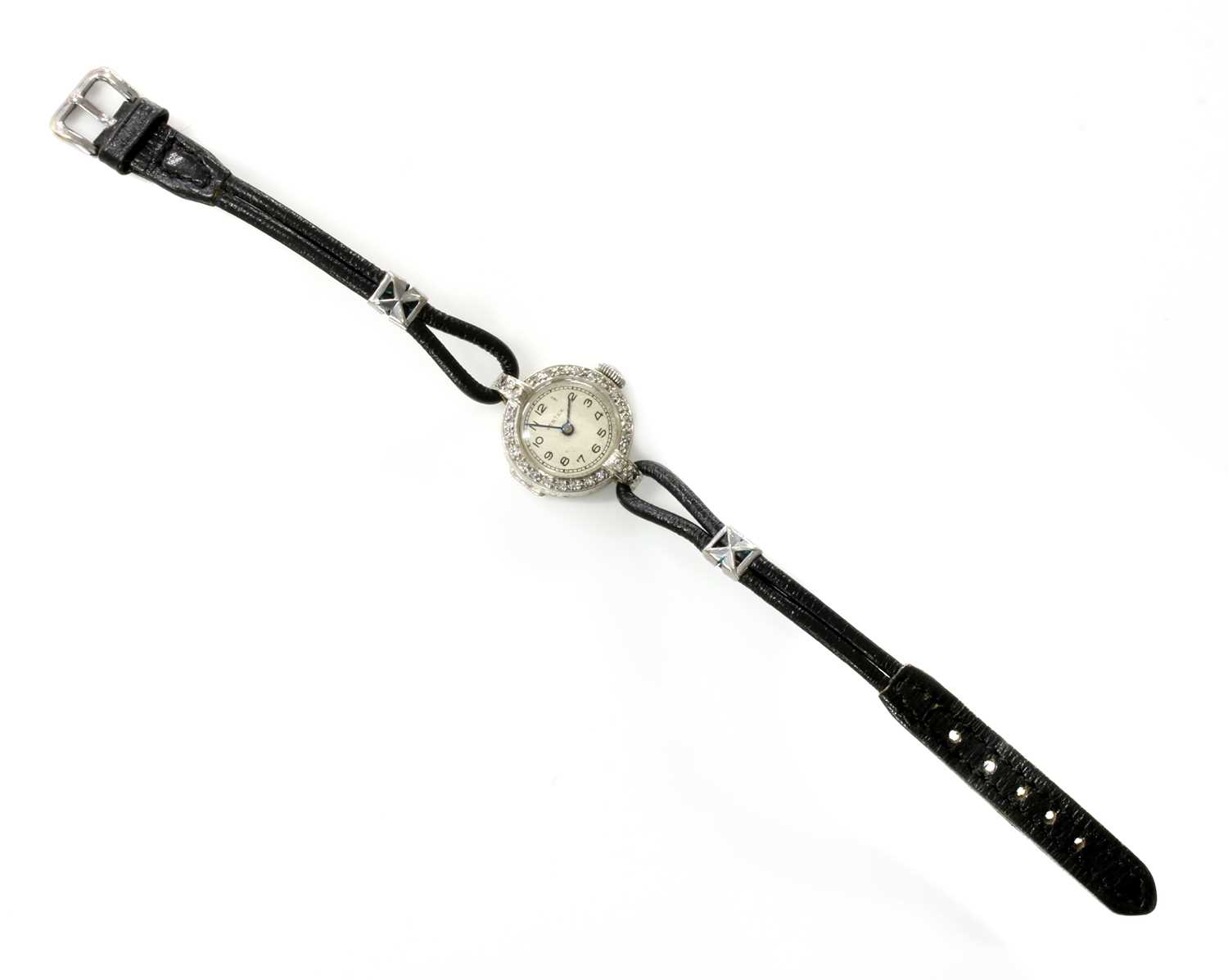 Lot 220 - A ladies' 18ct white gold diamond set Vertex mechanical strap watch, c.1930