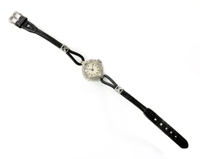 Lot 220 - A ladies' 18ct white gold diamond set Vertex mechanical strap watch, c.1930