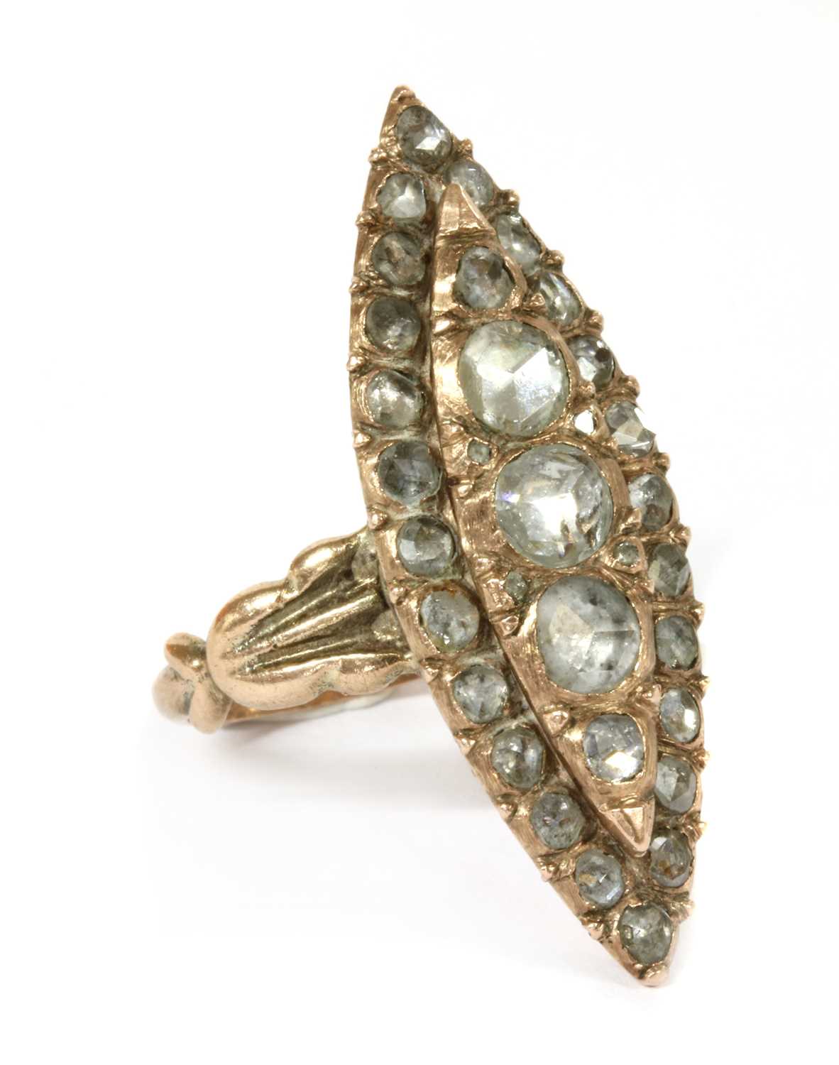 Lot 7 - An early 20th century gold navette shaped diamond cluster ring