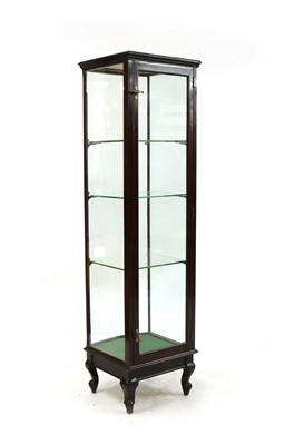Lot 233 - A mahogany bow front tower shop cabinet
