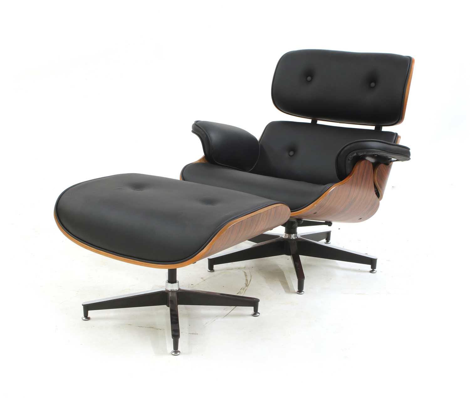 Lot 238 - A modern lounger and ottoman