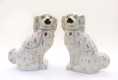 Lot 274 - A pair of 19th Century Staffordshire dogs