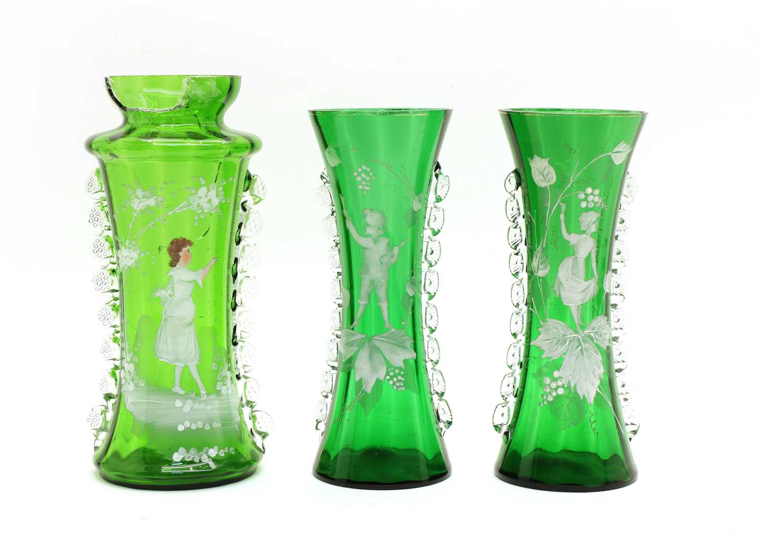 Lot 63 - A pair of large green 'Mary Gregory' vases