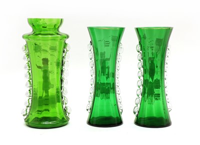 Lot 63 - A pair of large green 'Mary Gregory' vases