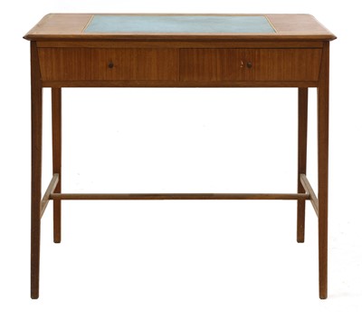 Lot 385 - A teak writing table