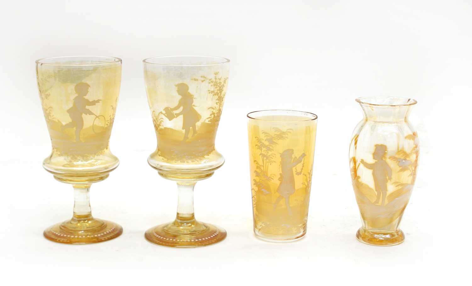 Lot 92 - A quantity of amber glass 'Mary Gregory' items
