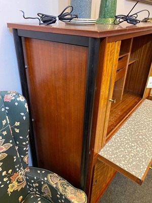 Lot 384 - A teak and maple cocktail cabinet