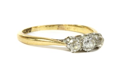 Lot 48 - A gold three stone diamond ring