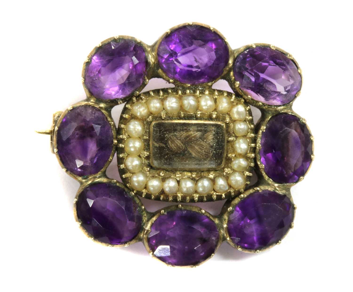 Lot 1 - A Victorian gold amethyst and woven hair brooch