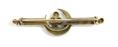 Lot 4 - A late Victorian diamond and split pearl crescent brooch