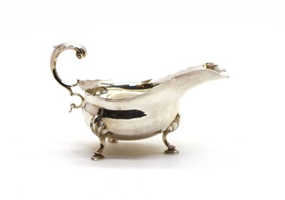 Lot 56 - A George V silver cream jug