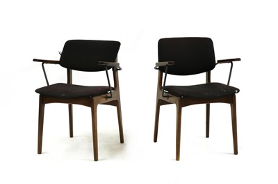 Lot 242 - A pair of mid-century teak and metal framed elbow chairs