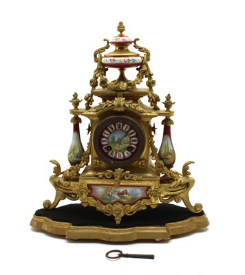 Lot 173 - A 19th century French ormolu and porcelain mounted mantel clock