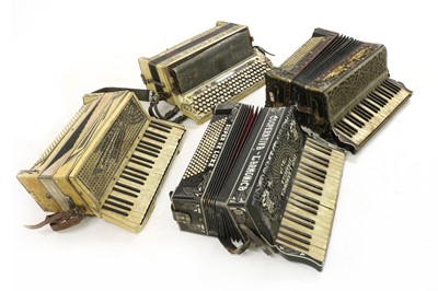 Lot 215 - A collection of four accordions