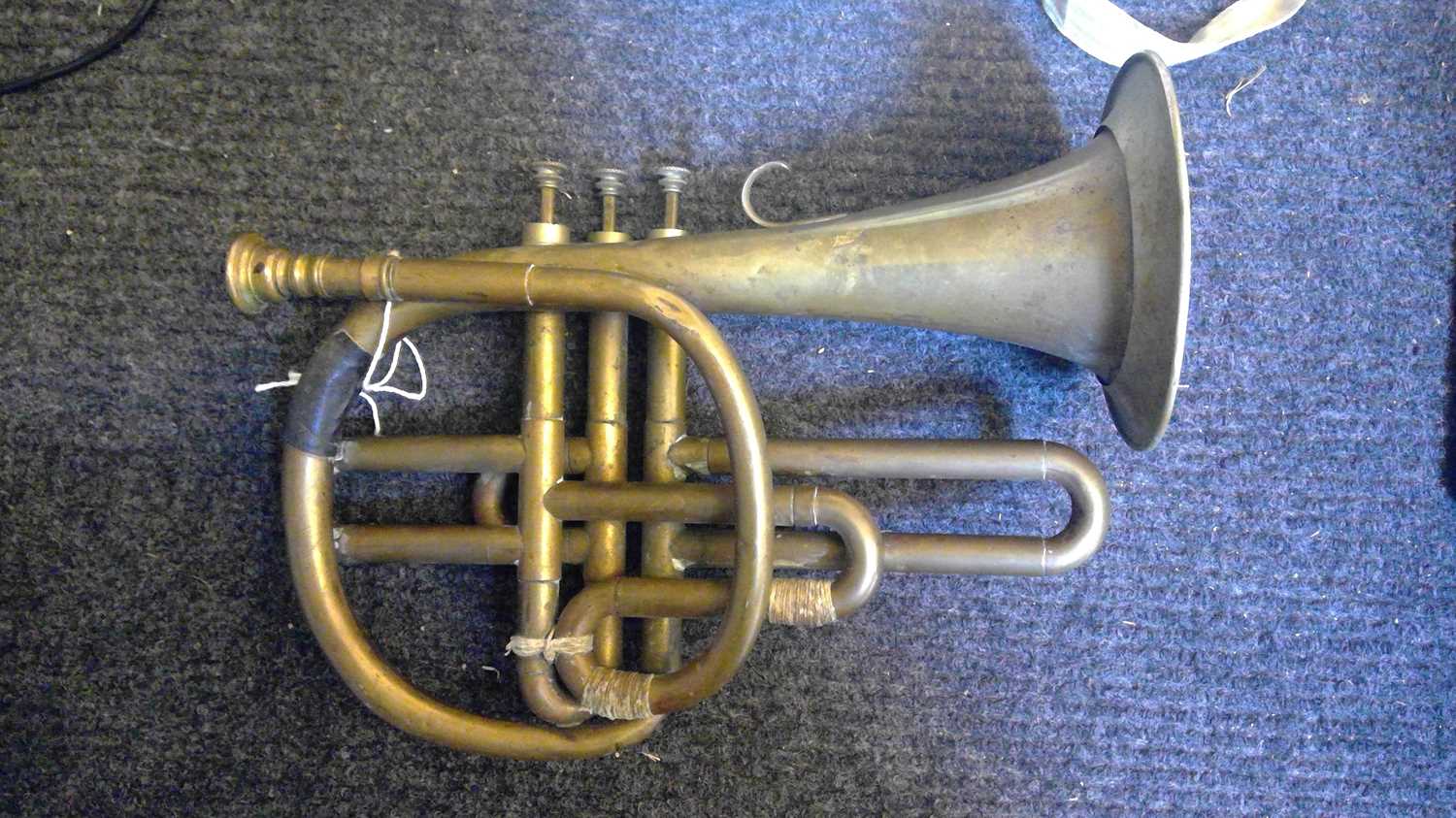 Lot 206 A collection of 'trumpet family' instruments,