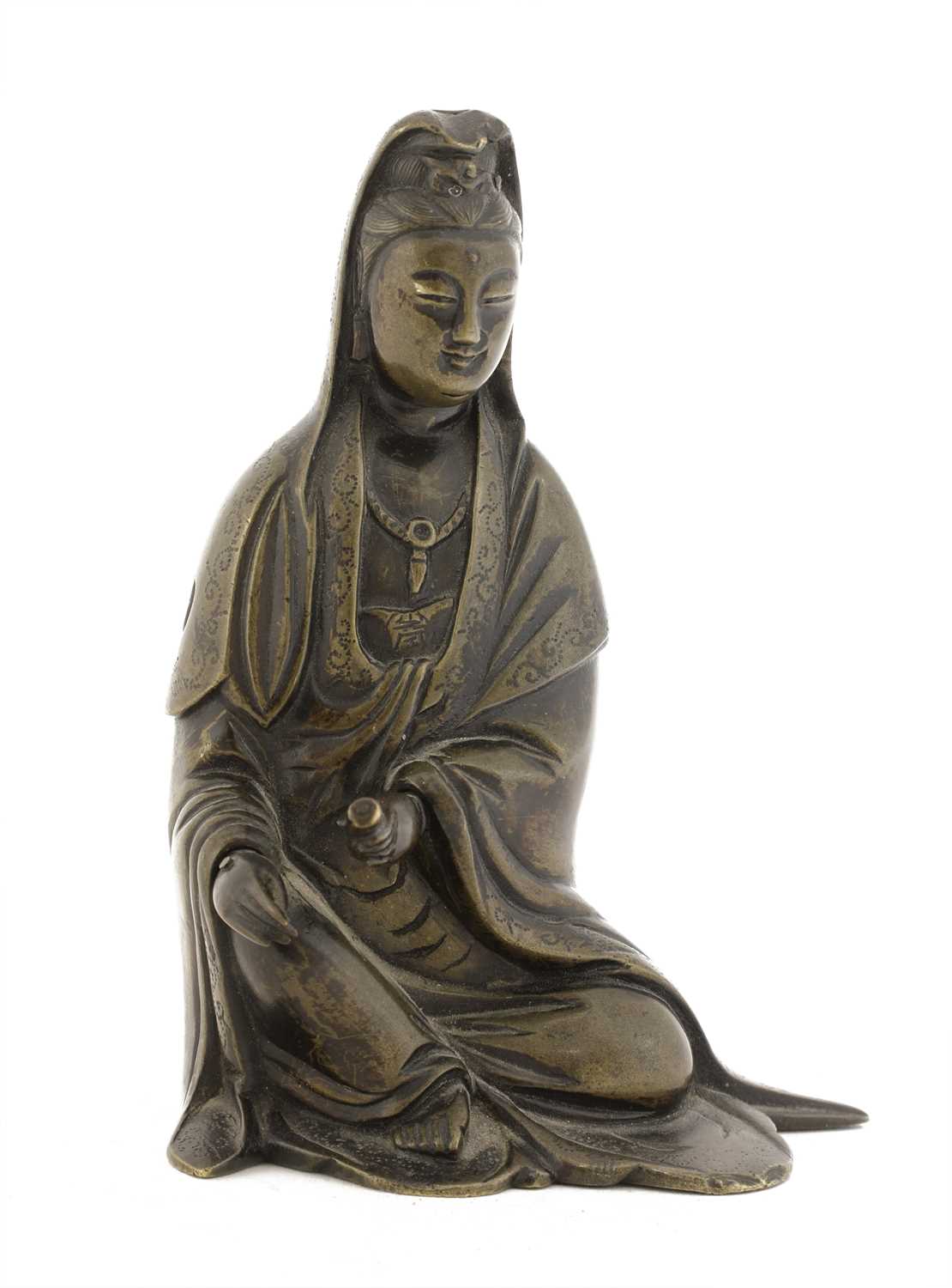 Lot 117 - A Chinese bronze Guanyin