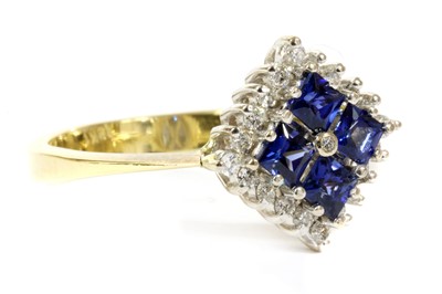 Lot 136 - A sapphire and diamond off set square cluster ring