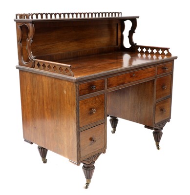 Lot 133 - A colonial rosewood desk
