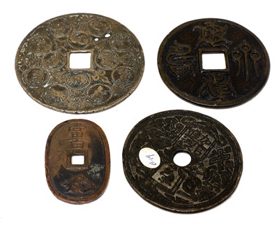 Lot 250 - A collection of four Chinese metal coins