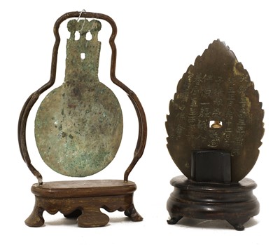 Lot 236 - A Chinese bronze mandorla