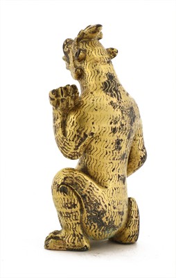 Lot 120 - A Chinese gilt-bronze figure