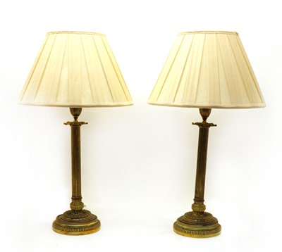 Lot 191 - A pair of brass table lamps