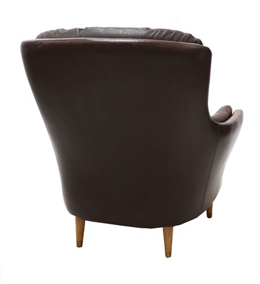 Lot 491 - A Danish leather button back armchair