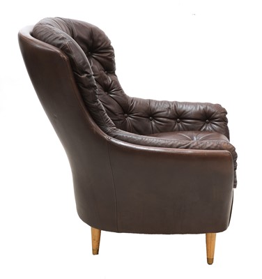 Lot 491 - A Danish leather button back armchair