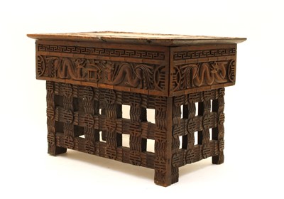 Lot 180 - A 19th Century carved Chinese portable reading table