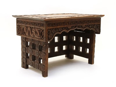 Lot 180 - A 19th Century carved Chinese portable reading table