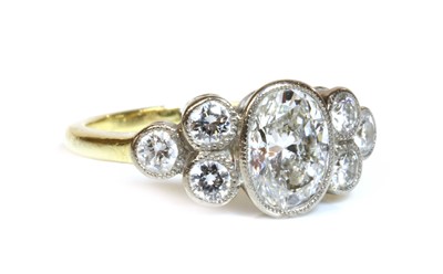 Lot 329 - Property of a Lady.  A two colour gold seven stone diamond ring