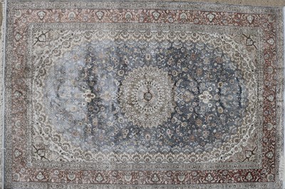 Lot 240 - A wool and silk rug of Persian Tabriz design