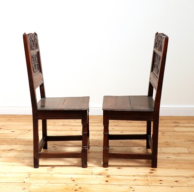 Lot 412 - A pair of Charles II oak backstools