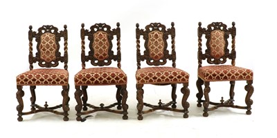 Lot 395 - A set of four Continental walnut chairs