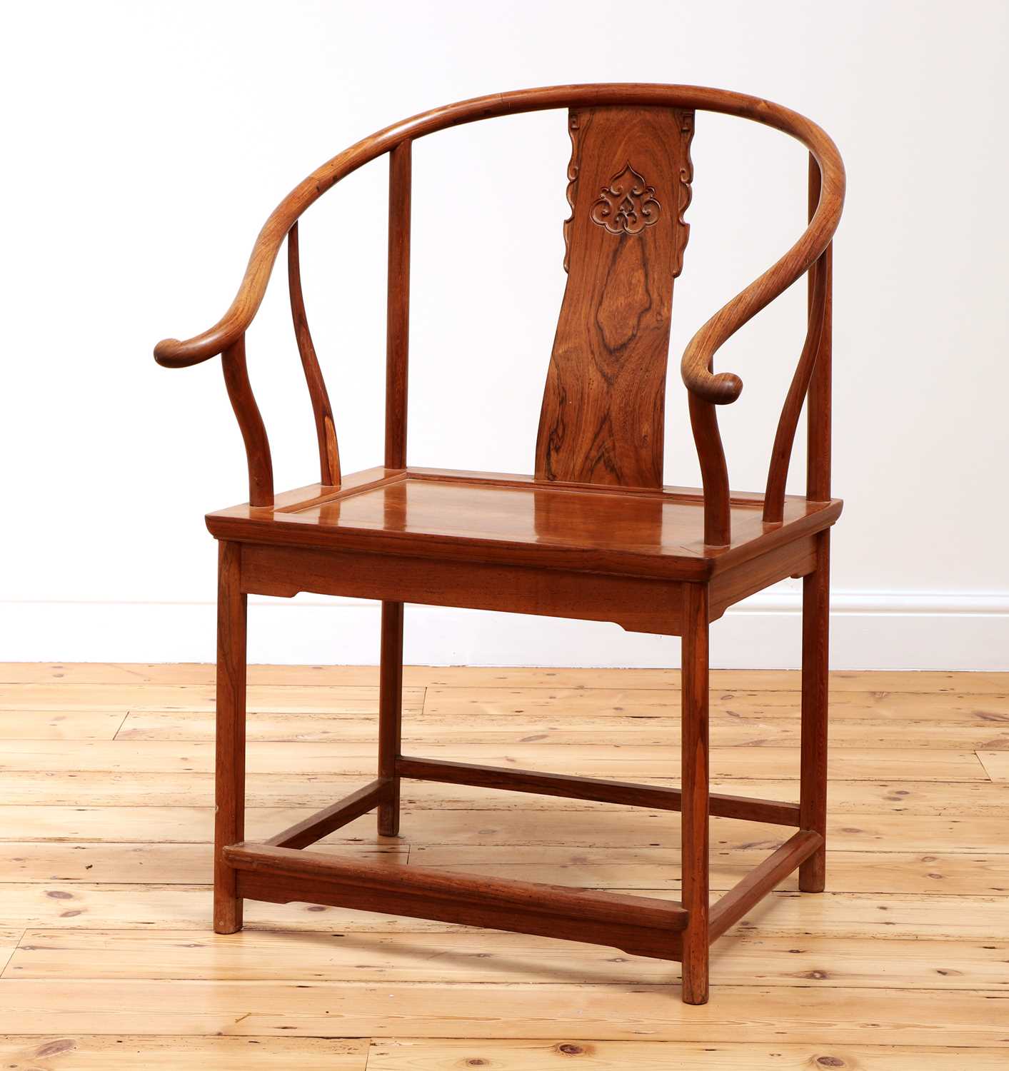 Lot 111 - A Chinese horseshoe back chair