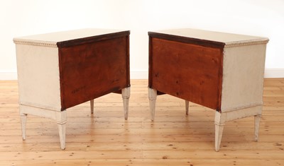 Lot 422 - A pair of French painted commodes