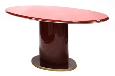 Lot 681 - An Italian red lacquer and brass dining table