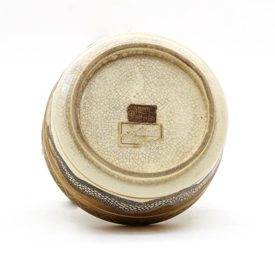 Lot 65 - A Japanese Satsuma pottery jar and cover