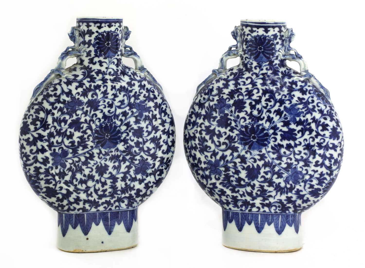 Lot 16 - A pair of Chinese blue and white moon flasks