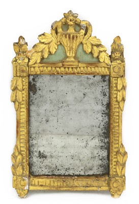 Lot 599 - A painted and gilt wall mirror