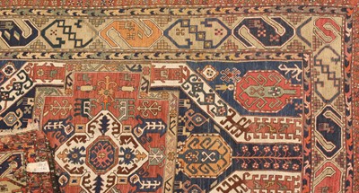 Lot 429 - A large kilim rug