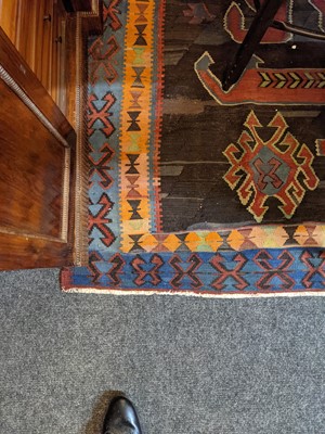 Lot 429 - A large kilim rug