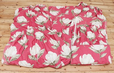 Lot 110 - A pair of pink floral interlined curtains